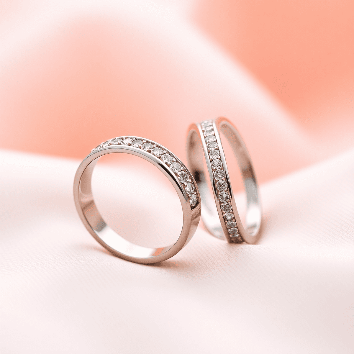 A modern couple's ring set displayed on a soft romantic background, highlighting their elegant design and symbolizing love and commitment.