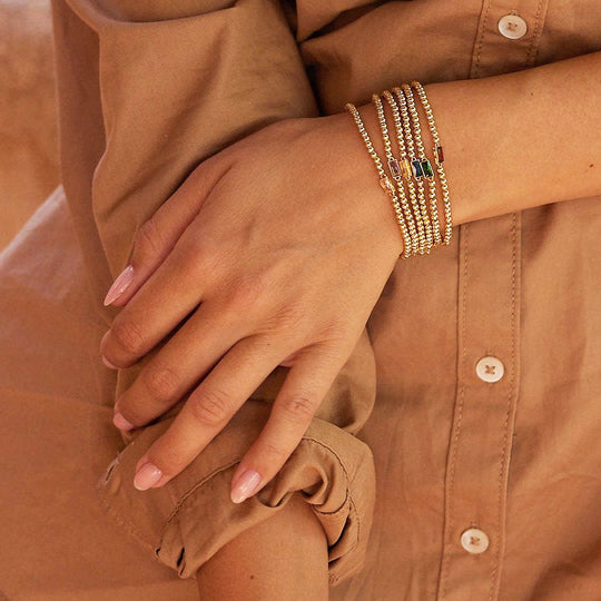 Baguette Birthstone Stretch | Gold | Diamond Simulant | Luxe6496 - bangle | Singapore Jewellery, Wedding Rings &amp; Gifts | Same Day Delivery | Tiara.com.sg