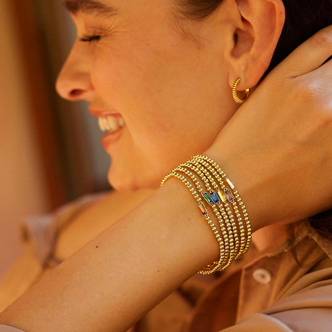 Baguette Birthstone Stretch | Gold | Diamond Simulant | Luxe6496 - bangle | Singapore Jewellery, Wedding Rings &amp; Gifts | Same Day Delivery | Tiara.com.sg