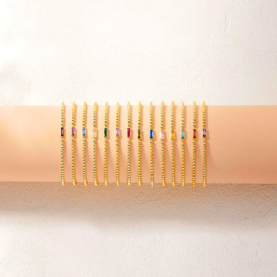 Baguette Birthstone Stretch | Gold | Diamond Simulant | Luxe6496 - bangle | Singapore Jewellery, Wedding Rings &amp; Gifts | Same Day Delivery | Tiara.com.sg