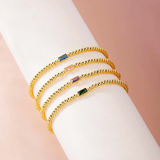 Baguette Birthstone Stretch | Gold | Diamond Simulant | Luxe6496 - bangle | Singapore Jewellery, Wedding Rings &amp; Gifts | Same Day Delivery | Tiara.com.sg