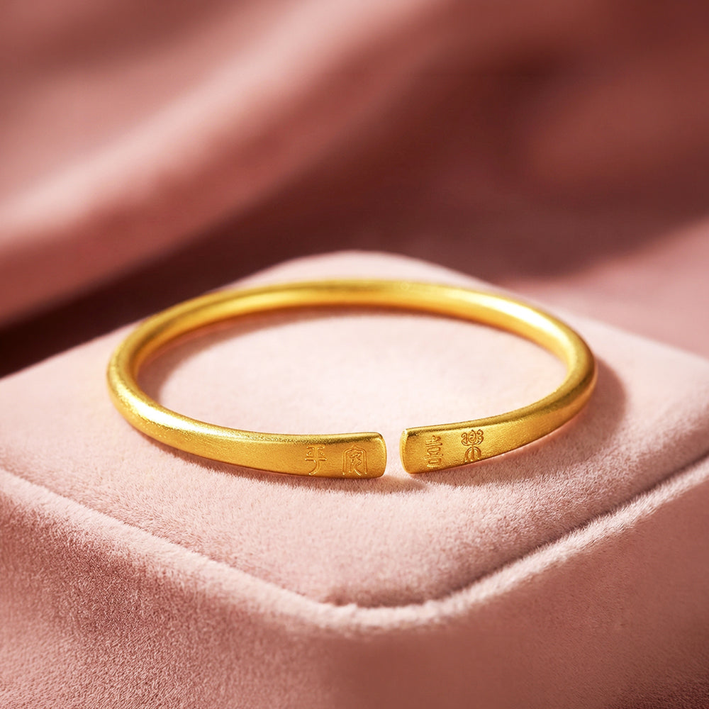 Ping An Xi Le Engraved Gold Bangle Bracelet | Luxe6543