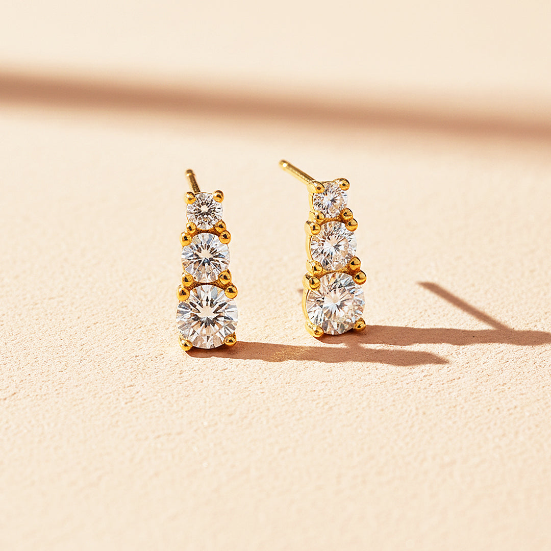 Graduated Triple Solitaire Stud Earrings | Moissanite | 14K Gold Plated 925 Sterling Silver | Prm8124 - Earrings | Singapore Jewellery, Wedding Rings &amp; Gifts | Same Day Delivery | Tiara.com.sg