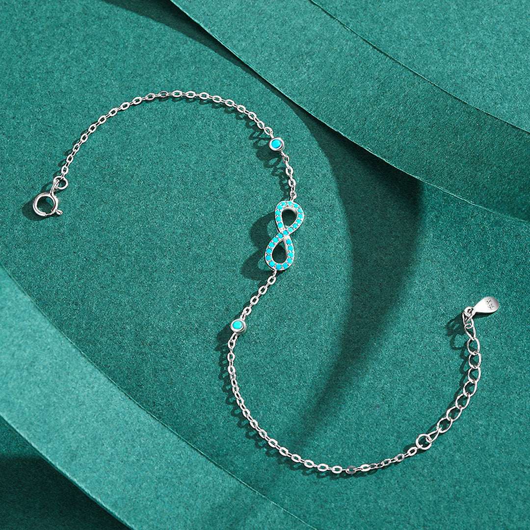 Turquoise Pavé Infinity Bracelet | Diamond Simulant | Prm9102 - Bracelets | Singapore Jewellery, Wedding Rings &amp; Gifts | Same Day Delivery | Tiara.com.sg