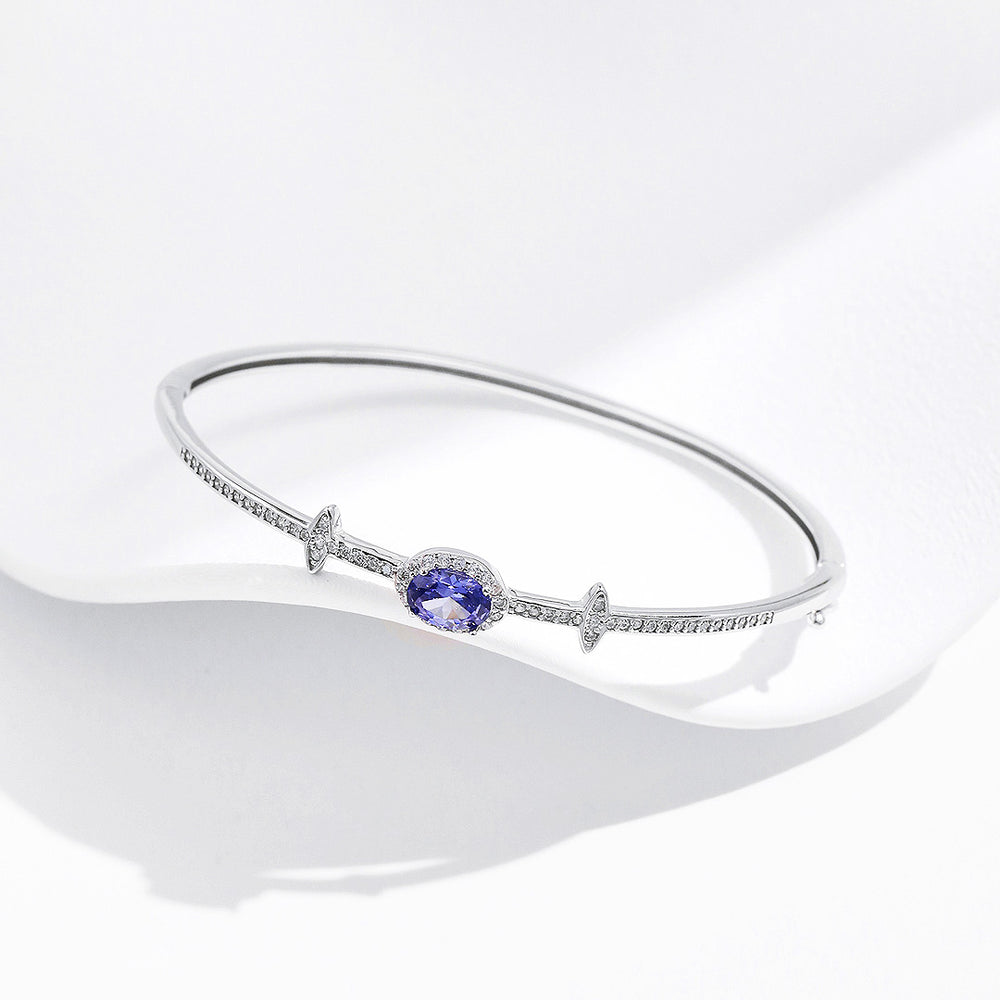 Sapphire Blue Oval Halo Bangle | Diamond Simulant | Prm9118 - Bracelets | Singapore Jewellery, Wedding Rings & Gifts | Same Day Delivery | Tiara.com.sg