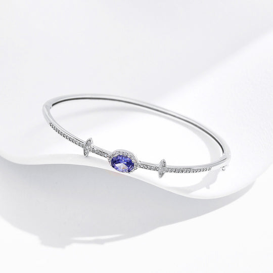Sapphire Blue Oval Halo Bangle | Diamond Simulant | Prm9118 - Bracelets | Singapore Jewellery, Wedding Rings &amp; Gifts | Same Day Delivery | Tiara.com.sg